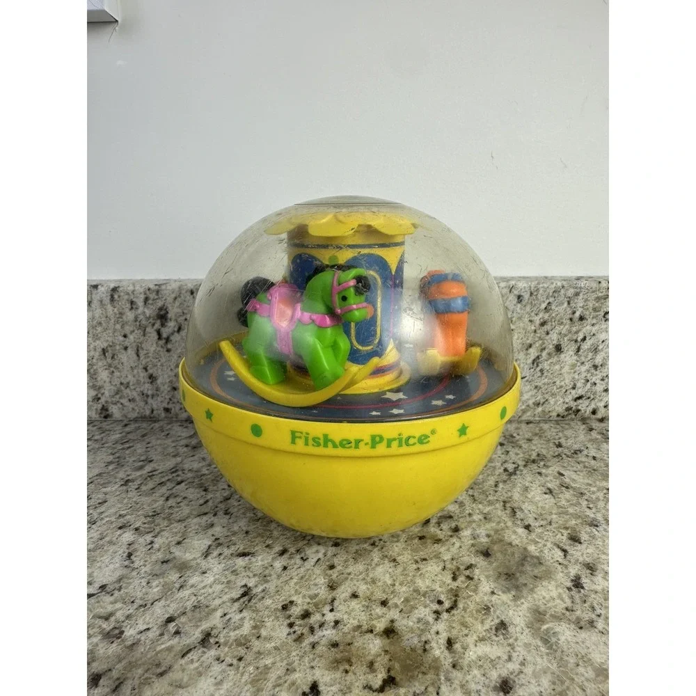 Vintage 1985 Fisher Price Roly Poly Chime Ball Carousel Yellow 1150 nostalgia